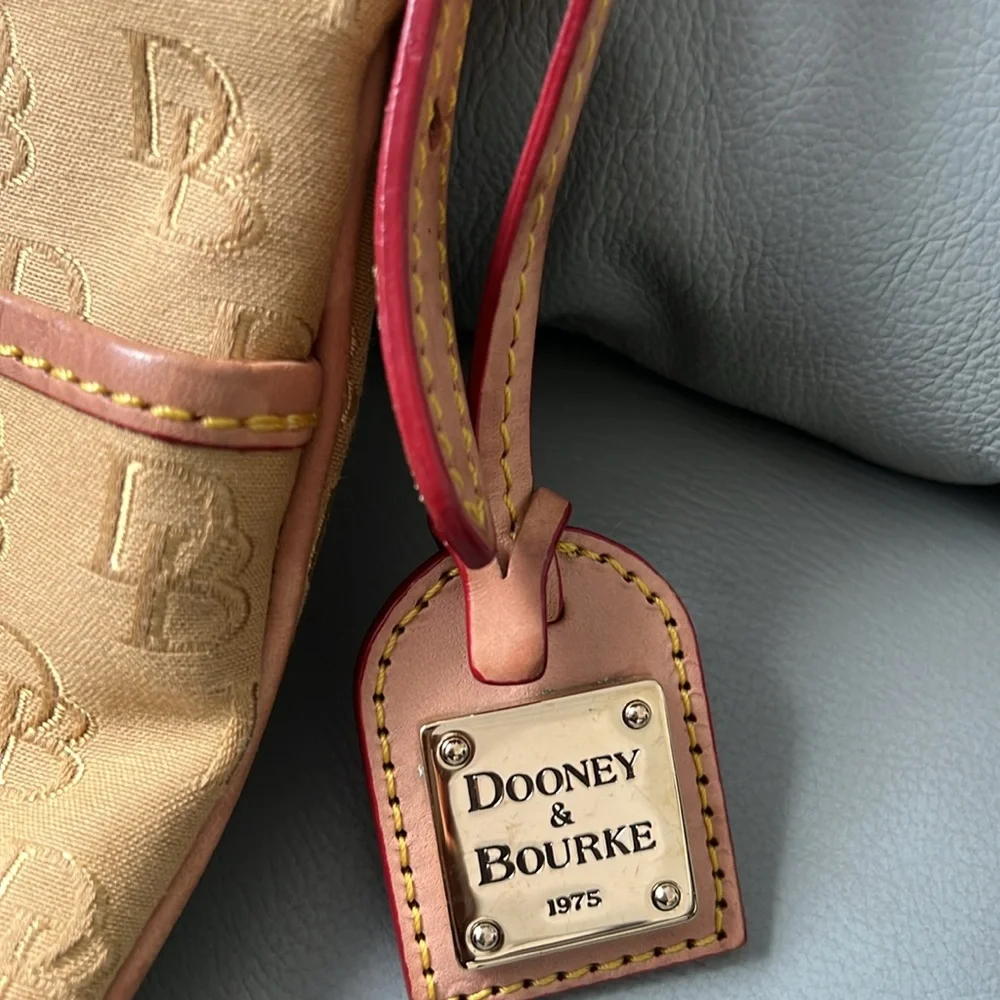 Dooney & Bourke Tan canvas DB signature Crossbody Bag with Leather Trim